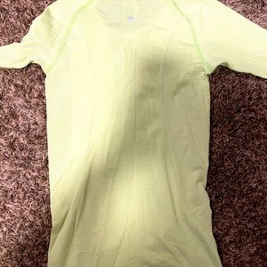 Lululemon long sleeve shirt, yellow, used but in good condition, size 4